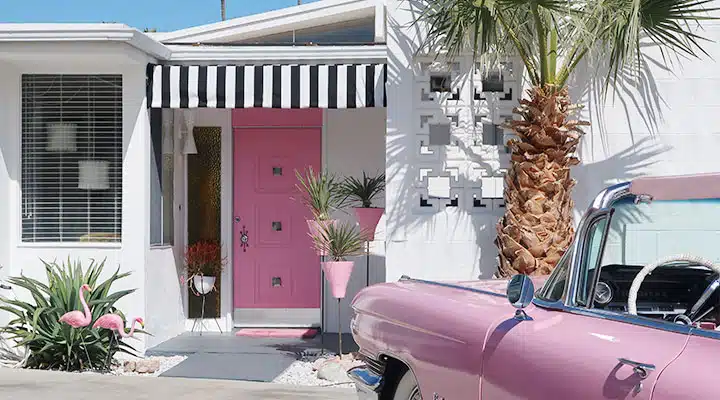 Door-Tour-TaffyPink A car parked in front of a window