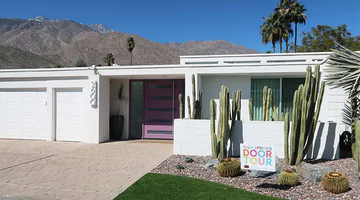 Door-Tour-VioletMajesty-2 A building with a mountain in the background