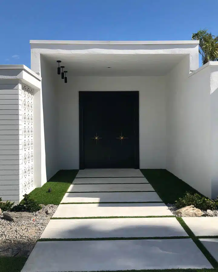 Door_Tour_10-720x900 A bench on the side of a building