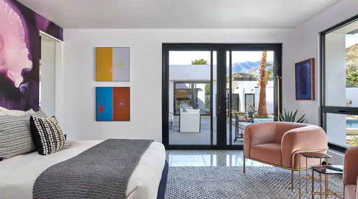 DunnEdwards_02282020_5996-720x400 A hotel room with a bed and chair