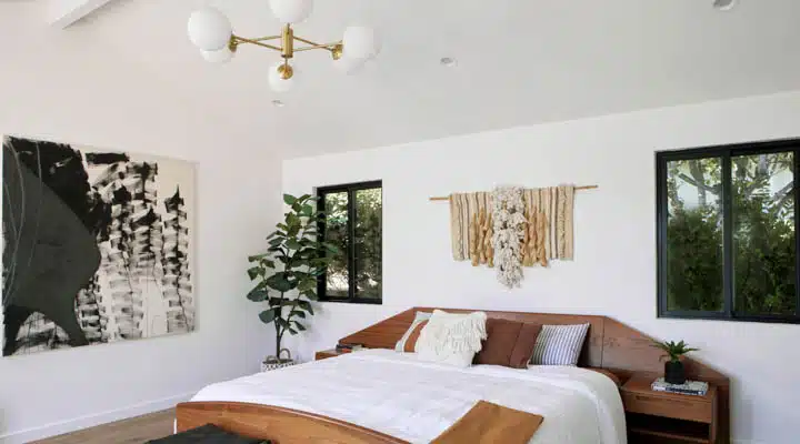 DunnEdwards_061820_0424-720x400 A bedroom with a large bed in a room