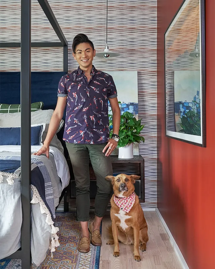 DunnEdwards_09252018_3811-720x900 A person holding a dog posing for the camera