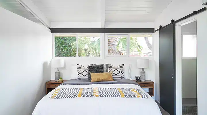 DunnEdwards_10312018_0893-720x400 A bedroom with a bed and a window