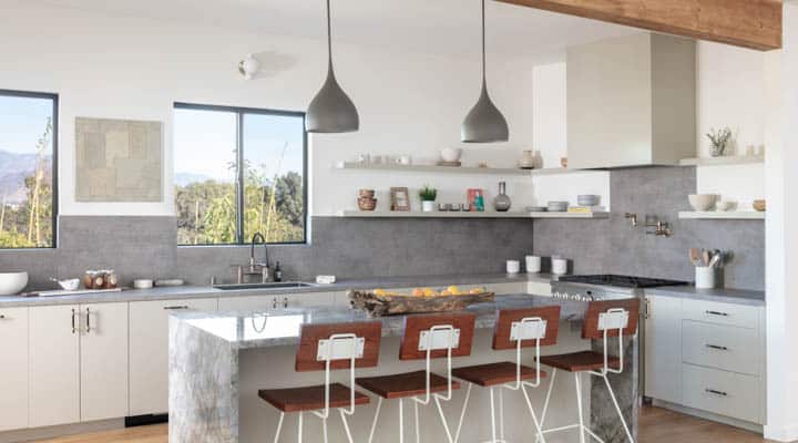 A kitchen with a sink and a window