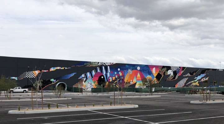 A airplane that is parked on the side of a road