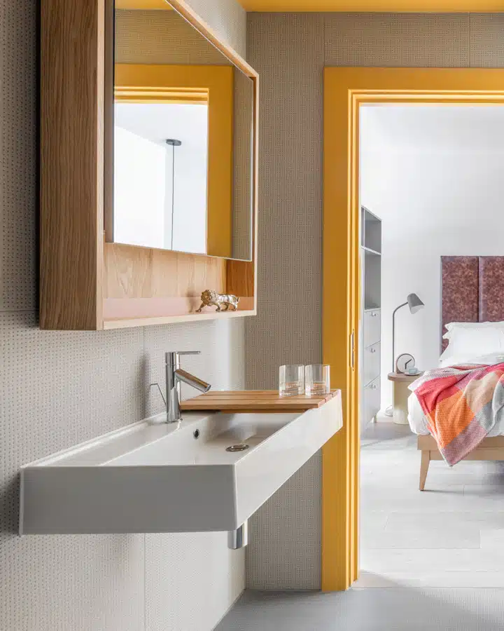 Eden-Locke-studio-bathroom A bedroom with a large mirror