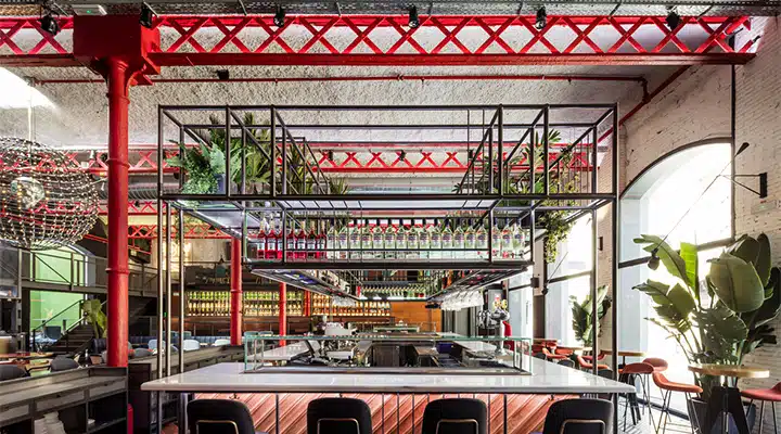 El-Mama-2-720x400 A train is parked on the side of a building