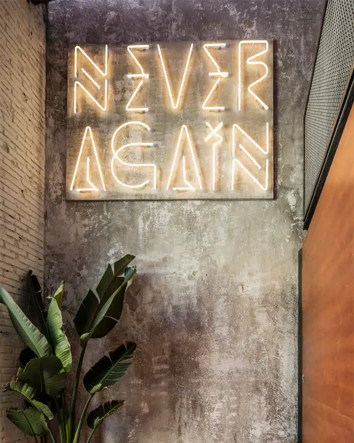 El-Mama-4-720x900 A sign on the side of a building