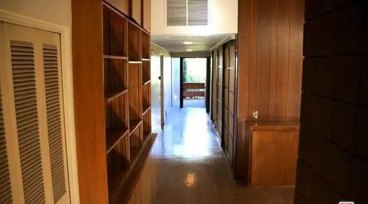 Entry-720x900 A room with an open door