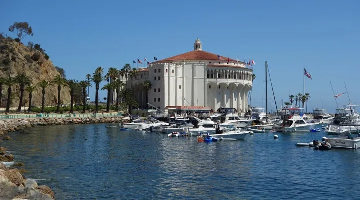 Exterior-1 A boat is docked next to a body of water