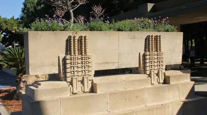 Exterior-Hollyhock A stone building