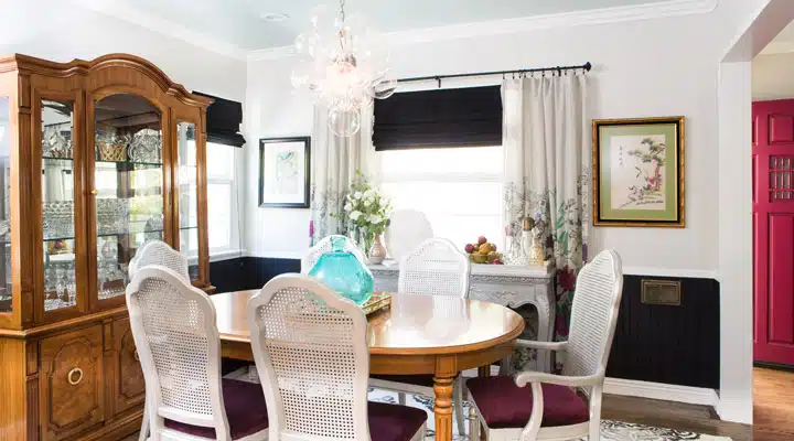 F-Marilynn-Pasadena-Dining-Room-1-1 A living room filled with furniture and a fire place sitting in a chair