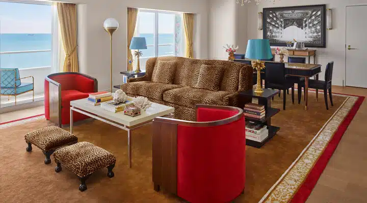 Faena-Suite_Living-Room-_Photo-by-Nik-Koenig A living room filled with furniture and a large window