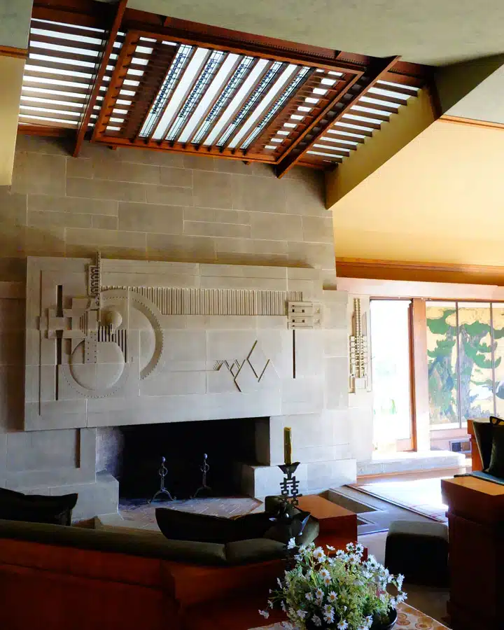 Fireplace-2 A living room filled with furniture and vase of flowers on a table