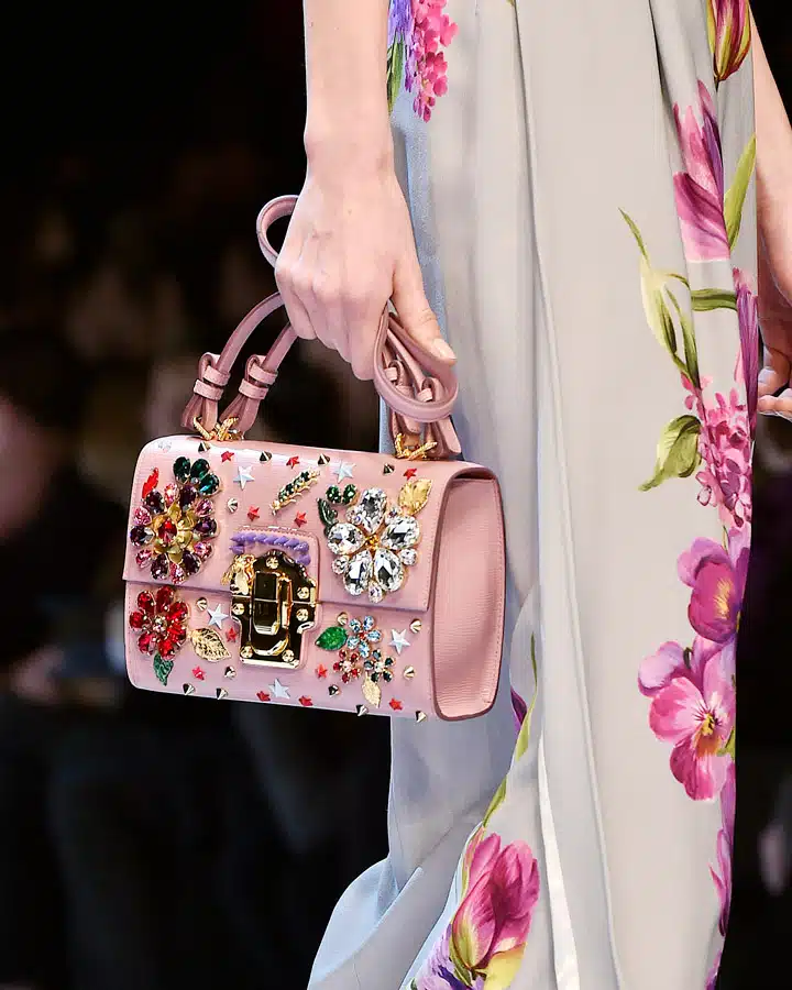 GettyImages-512855640_master A person wearing a pink flower