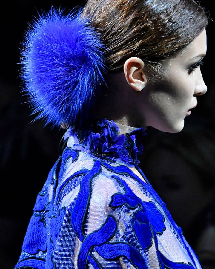 A close up of a person wearing a costume