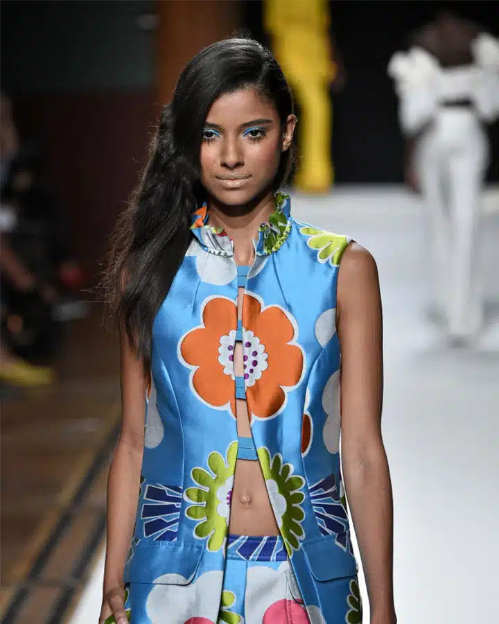 GettyImages-856370502_comp_1024-720x900 A girl in a blue dress