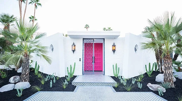 GoldenState_ModernismWeek_11 A living area with palm trees