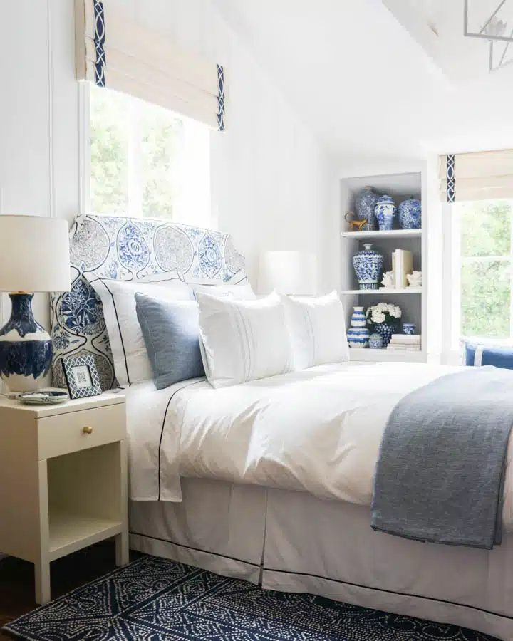 Guest_Bedroom_1_-_Serena_Brosio_Design_LLC_and_Slesinski_Design_Group_Inc-720x900 A bedroom with a bed and a chair in a room