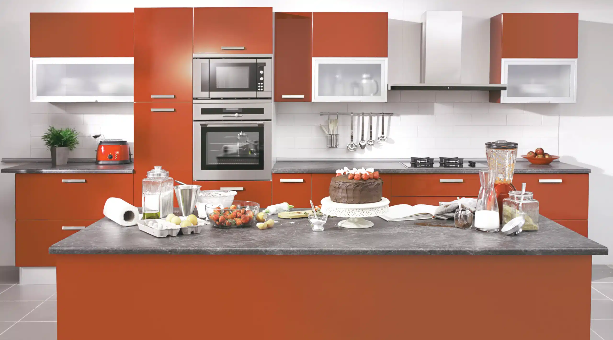 Making a cake A kitchen with a sink and a microwave