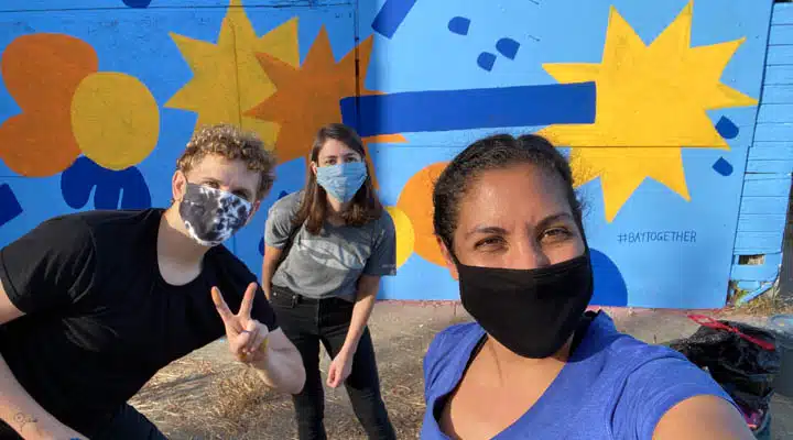 IMG_0275-720x400 A person standing next to a child