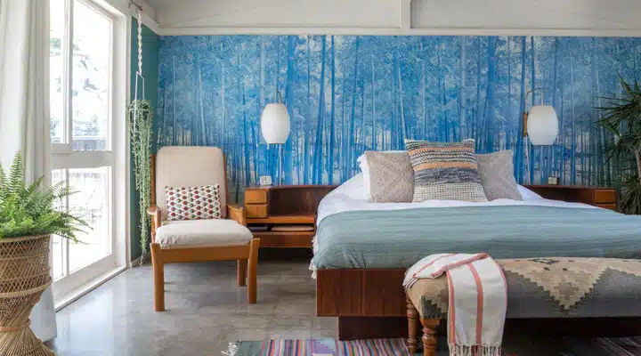 IMG_0289 A bedroom with a view of a living room