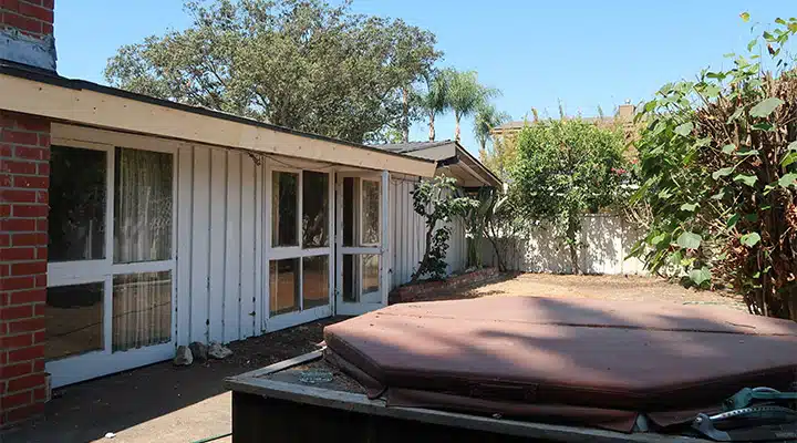 IMG_0963-720x400 A car parked in front of a brick building