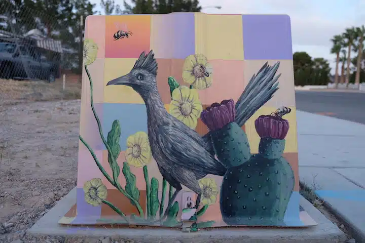 IMG_0976 A bird sitting on top of a table