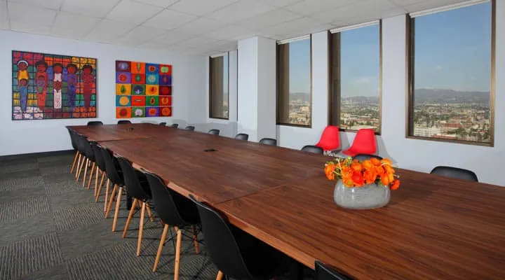 IMG_1062-720x400 A living room filled with furniture and a large window