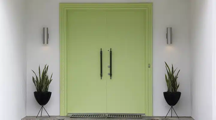 IMG_2219 A living room filled with furniture and vase of flowers on a table