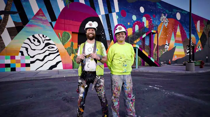 IMG_3586-720x400 A person holding a sign posing for the camera