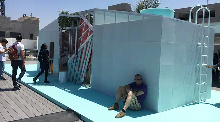 IMG_4101_720x400 A group of people standing in front of a building