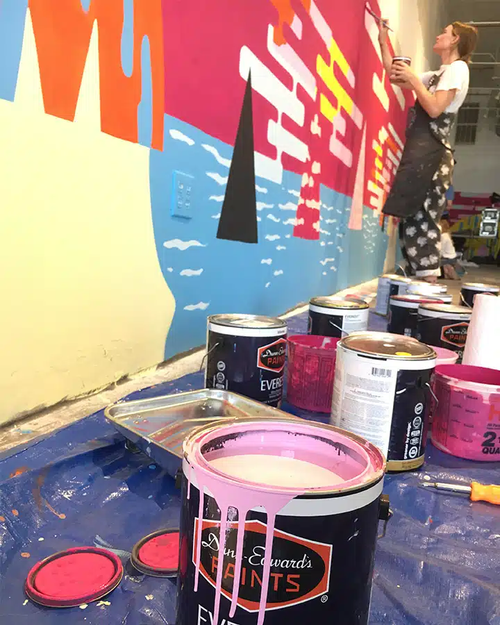 IMG_4121-720x900 A group of people standing around a table