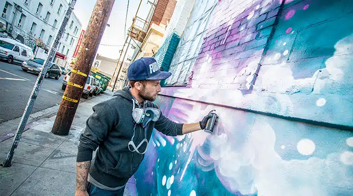 IMG_4238-720x400 A man standing on a sidewalk