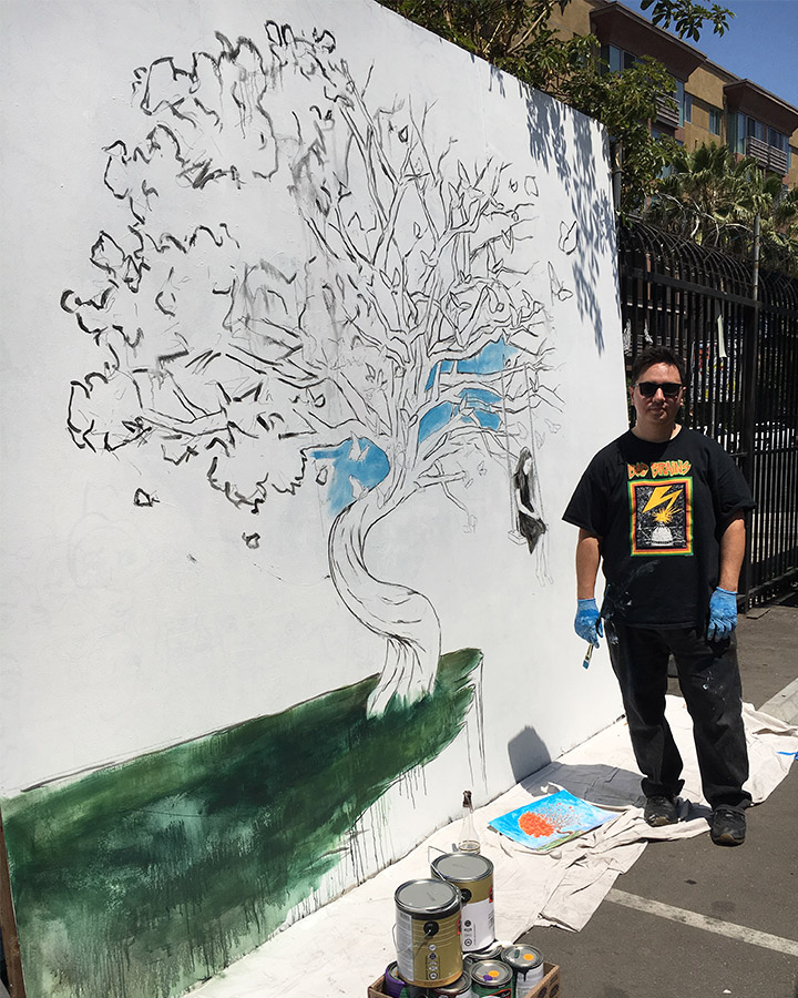A man standing on a snow board