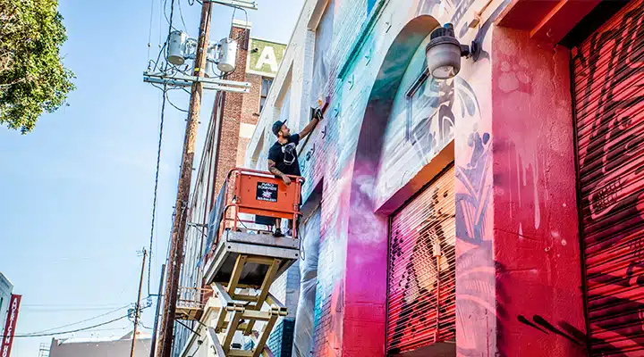IMG_4323-720x400 A group of people standing in front of a building