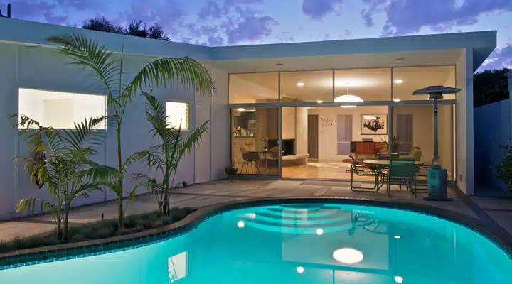 IMG_7920 A pool next to a palm tree