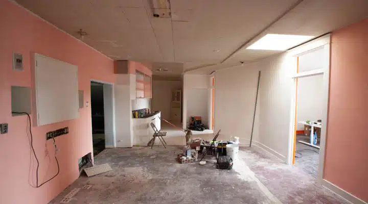 IMG_8096-Edit-720x400 A living room filled with furniture and a fireplace