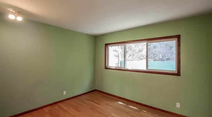 A room with a sink and a window