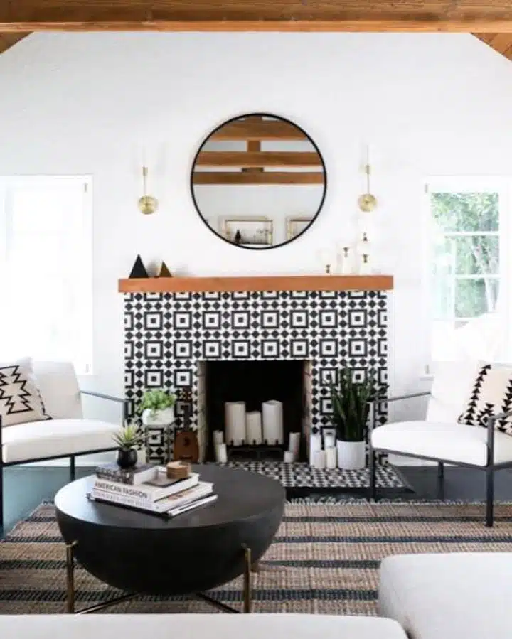 Jaclyn-Johnson-Living-Room-_1_ A living room filled with furniture and a large window