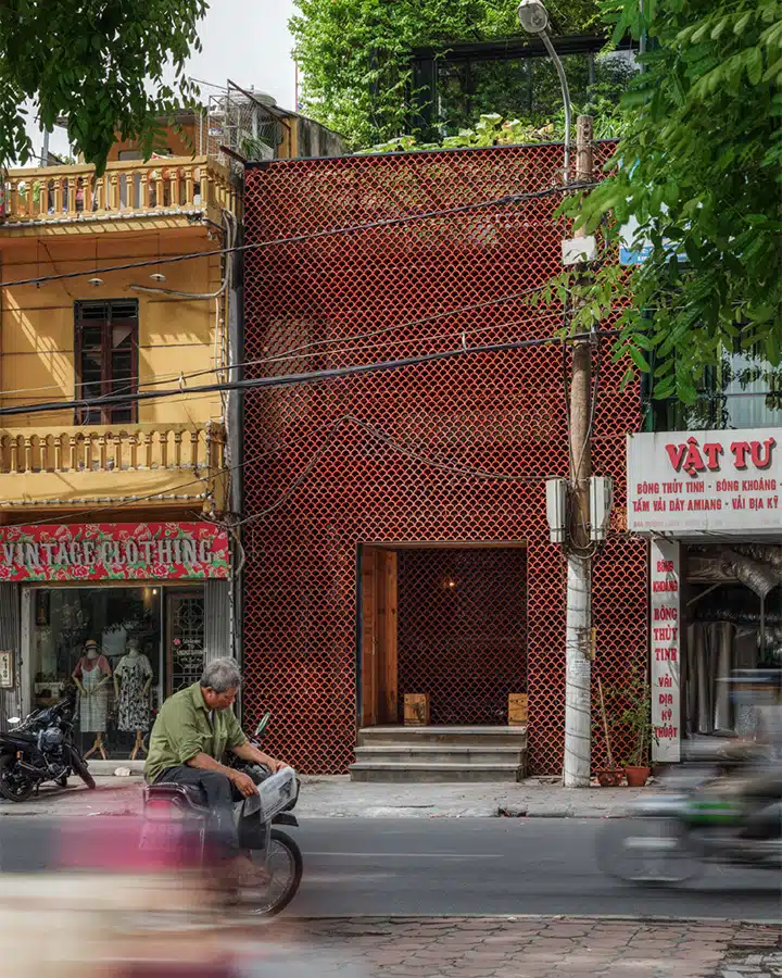 Koi-Cafe-Exterior-720x900 A sign on the corner of a street