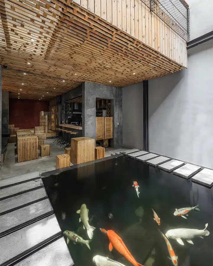 Koi-Cafe-Koi-Pond-720x900 The inside of a building