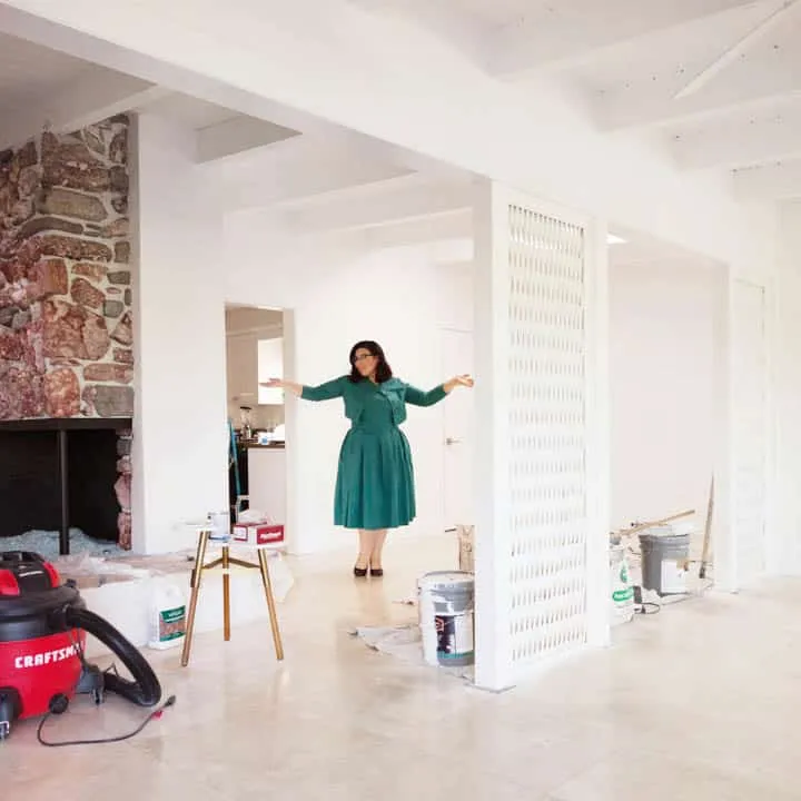 Krys_Reno-720x720 A person standing in a room