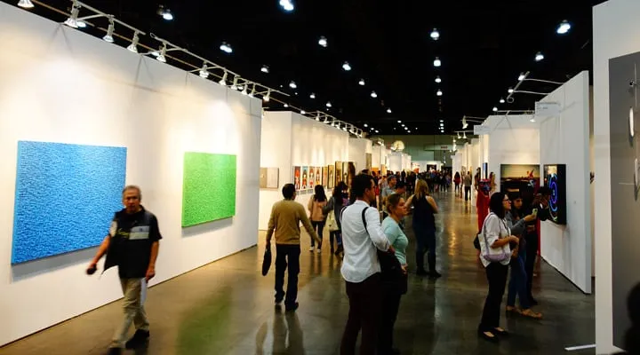 LA-Art-Show-2 A group of people standing in a room