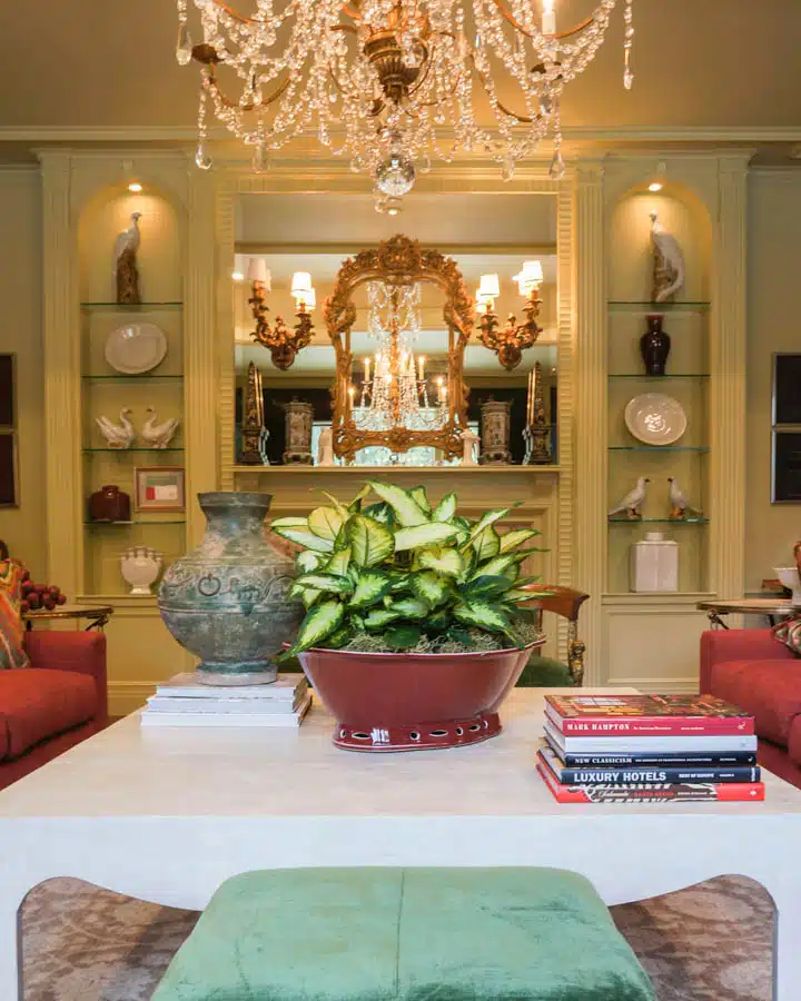 Living_Room_2_-_Louise_O_Malley_Inc-720x900 A room filled with furniture and vase of flowers on a table