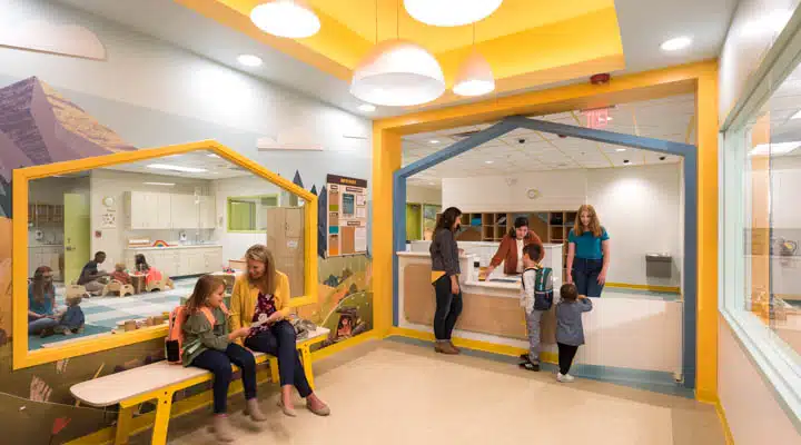 Lodgic_champaign_people_lowres_unretouched-227-720x400 A group of people standing in a room