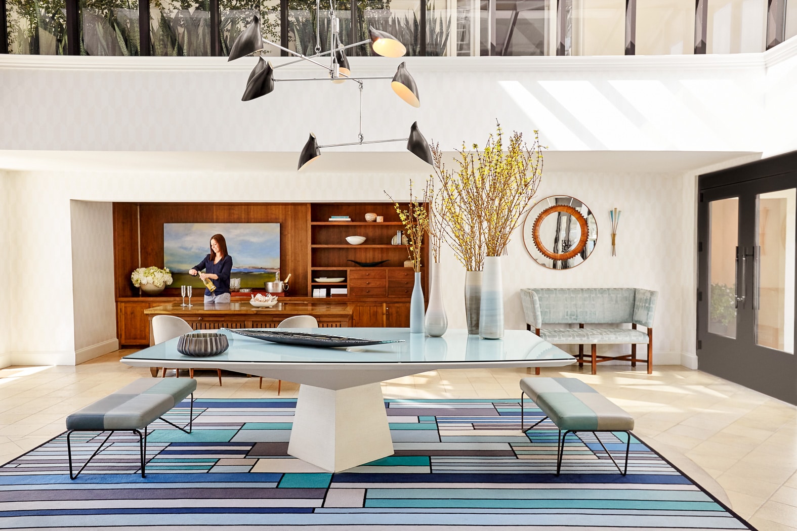 A dining room table in front of a window