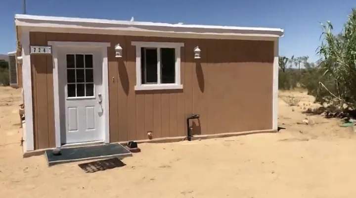 Photo_Aug_14__5_49_57_PM An empty parking lot in front of a building