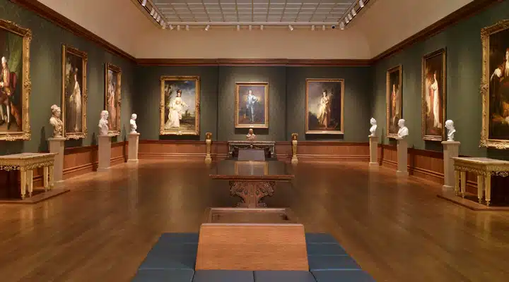 PortraitGalleryresize A living room filled with furniture and a fire place