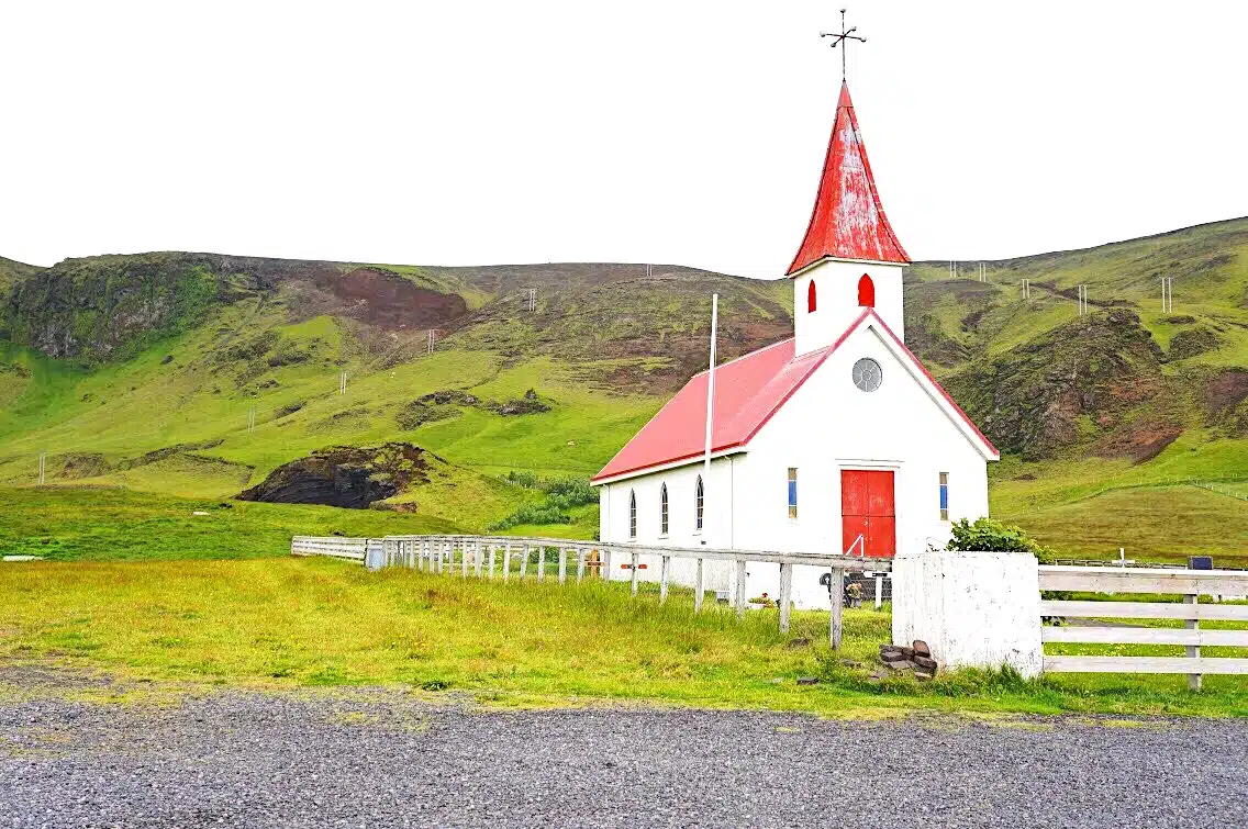 Red_and_White_Church_Countryside_Colors A church with a mountain in the background